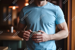 Man holding coffee cup blue t-shirt Product Image 1
