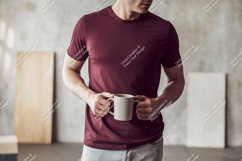 Man holding mug wearing maroon t shirt image Product Image 1