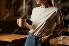 Woman holding steaming coffee mug beverage Product Image 1