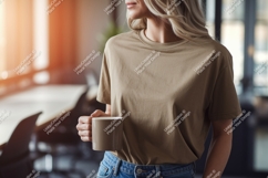 Woman wearing tan t shirt holding coffee mug image Product Image 1