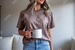 Woman holding white mug mockup t-shirt Product Image 1