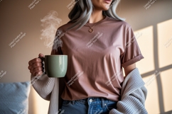 Woman holding steaming coffee mug beverage Product Image 1
