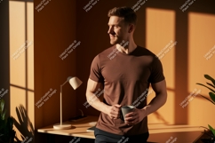 Man brown t shirt holding coffee cup image Product Image 1