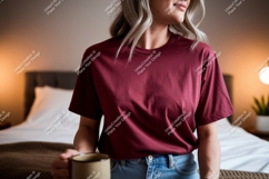 Woman wearing maroon t shirt holding mug image Product Image 1