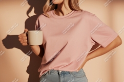 Woman holding mug wearing pink t shirt image Product Image 1