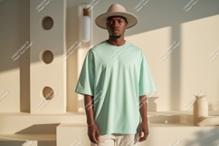 Man wearing mint green t shirt and hat image Product Image 1