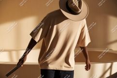 Man wearing beige t shirt and hat image Product Image 1