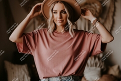 Woman wearing dusty rose t shirt and hat Product Image 1