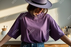 Woman wearing beige t shirt and hat image Product Image 1