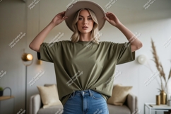 Woman wearing olive green t shirt and hat image Product Image 1