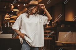 Woman wearing white t shirt and hat t-shirt casual Product Image 1