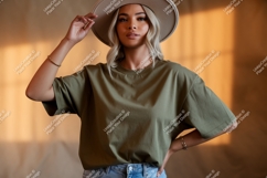 Woman wearing olive green t shirt and hat Product Image 1