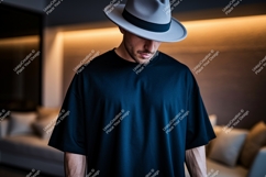 Man wearing dark t shirt and grey hat t-shirt Product Image 1