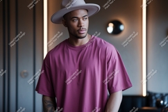 Man wearing pink t-shirt and hat fashion Product Image 1