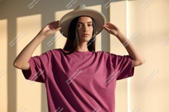 Woman wearing pink t shirt and hat image Product Image 1