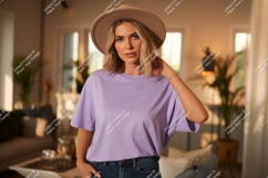 Woman wearing lavender t shirt and hat image Product Image 1