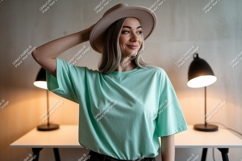 Woman wearing mint t shirt and hat image Product Image 1