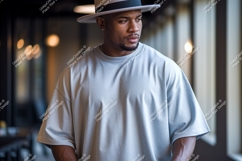 Man wearing grey t shirt and hat image Product Image 1
