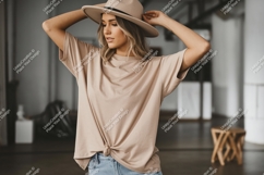 Woman wearing tan t shirt and hat image Product Image 1