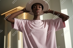 Woman wearing pink t shirt and hat image Product Image 1