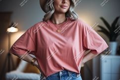 Woman wearing salmon pink t shirt image Product Image 1