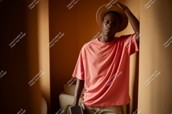 Man wearing coral t shirt and hat image Product Image 1
