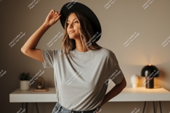 Woman wearing grey t-shirt and black hat image Product Image 1