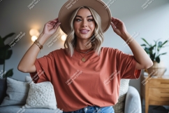 Woman wearing terracotta t shirt and tan hat image Product Image 1