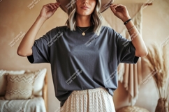 Woman wearing grey t shirt and hat image Product Image 1