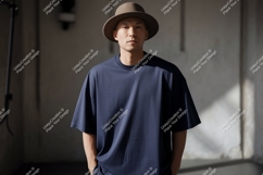Man wearing navy t-shirt and hat casual Product Image 1