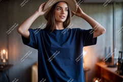 Woman wearing navy blue t shirt and hat image Product Image 1