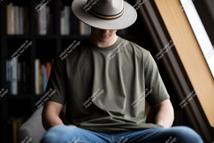 Man wearing olive green t shirt and hat image Product Image 1