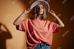 Woman wearing coral t shirt and hat Product Image 1