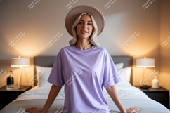 Woman wearing lavender t shirt and hat image Product Image 1