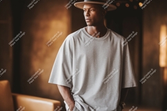 Man wearing grey t shirt and hat t-shirt fashion Product Image 1