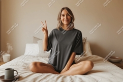 Woman peace sign relaxed bedroom image Product Image 1