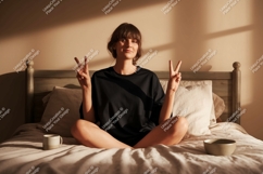 Woman peace sign on bed black Product Image 1