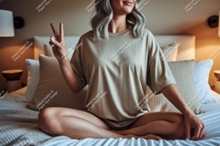Woman peaceful gesture on bed clothing Product Image 1