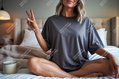 Woman in grey t shirt peace sign image Product Image 1