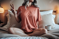 Woman wearing terracotta t shirt peace gesture image Product Image 1