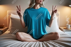 Woman wearing blue t shirt peace sign t-shirt Product Image 1