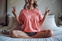 Woman wearing pink t shirt showing peace sign image Product Image 1