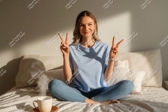 Young Woman Peace Sign Cozy Bedroom blue t-shirt Product Image 1