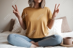 Woman wearing mustard t shirt peace sign image Product Image 1