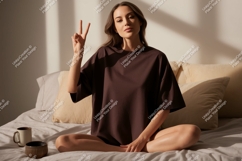 Woman peaceful gesture on bed brown Product Image 1