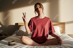 Woman peace sign in bedroom image Product Image 1