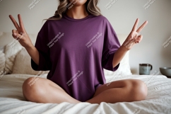 Woman wearing purple t shirt peace sign image Product Image 1