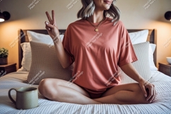 Woman wearing coral t shirt peace sign image Product Image 1