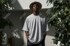 Man wearing grey t shirt and hat image Product Image 1