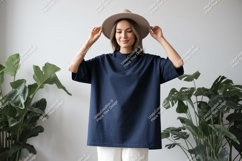 Woman wearing navy t shirt and hat image Product Image 1
